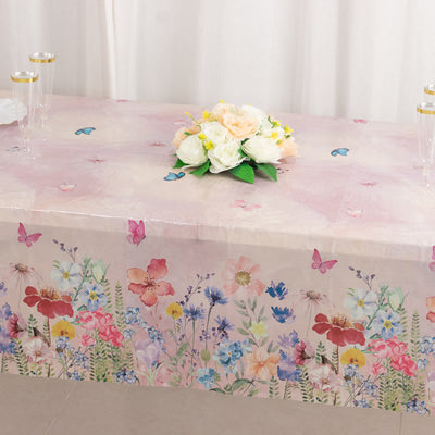 Floral tablecloth with butterflies and flowers, perfect for events and celebrations.