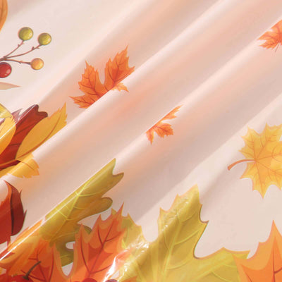 Autumn leaves design on a smooth fabric surface.