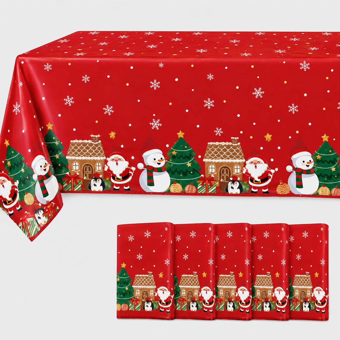 Red Christmas tablecloth with snowflakes, Santa, snowman, and gingerbread houses