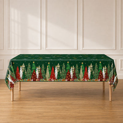 Christmas tree patterned tablecloth on dining table in a bright room