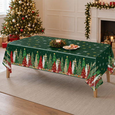 Christmas tablecloth on dining table with festive tree and fireplace decor