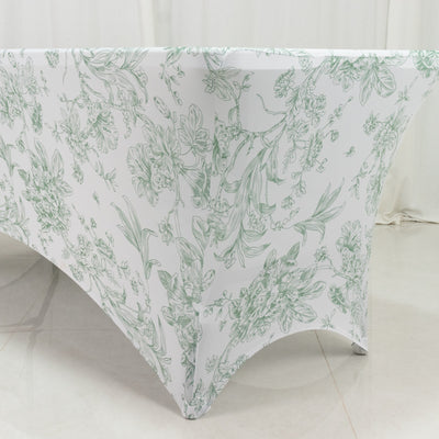 Floral patterned table cover on a white backdrop.