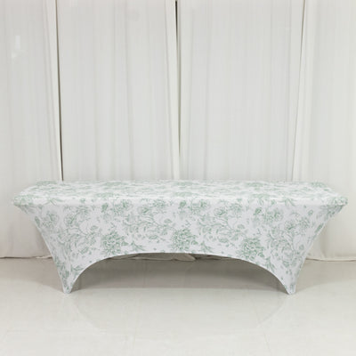 Floral-patterned table cover on a bench against a plain backdrop