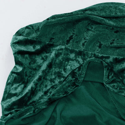 Green velvet fabric with soft texture and rich color detail.