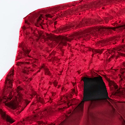 Red velvet fabric with a soft, luxurious texture.