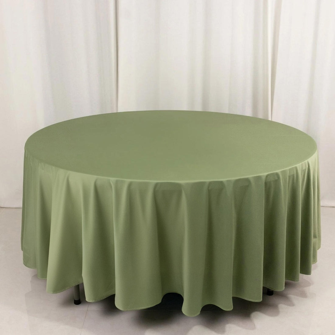 Round olive green tablecloth on a circular table
