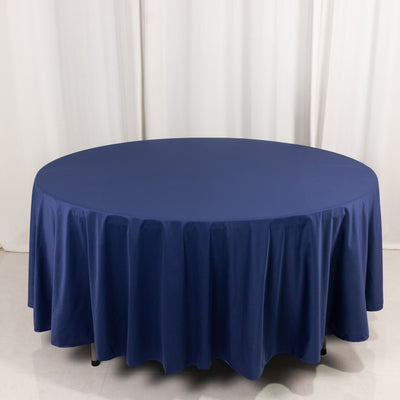Navy round tablecloth draped elegantly over a table