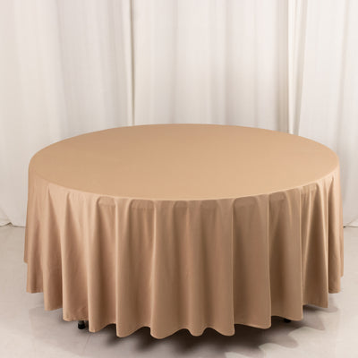 Round beige tablecloth draped elegantly on a round table