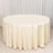 Cream tablecloth draped elegantly over an oval table.