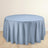 Light blue tablecloth on a round table against a plain background.