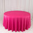 Pink round tablecloth on studio backdrop