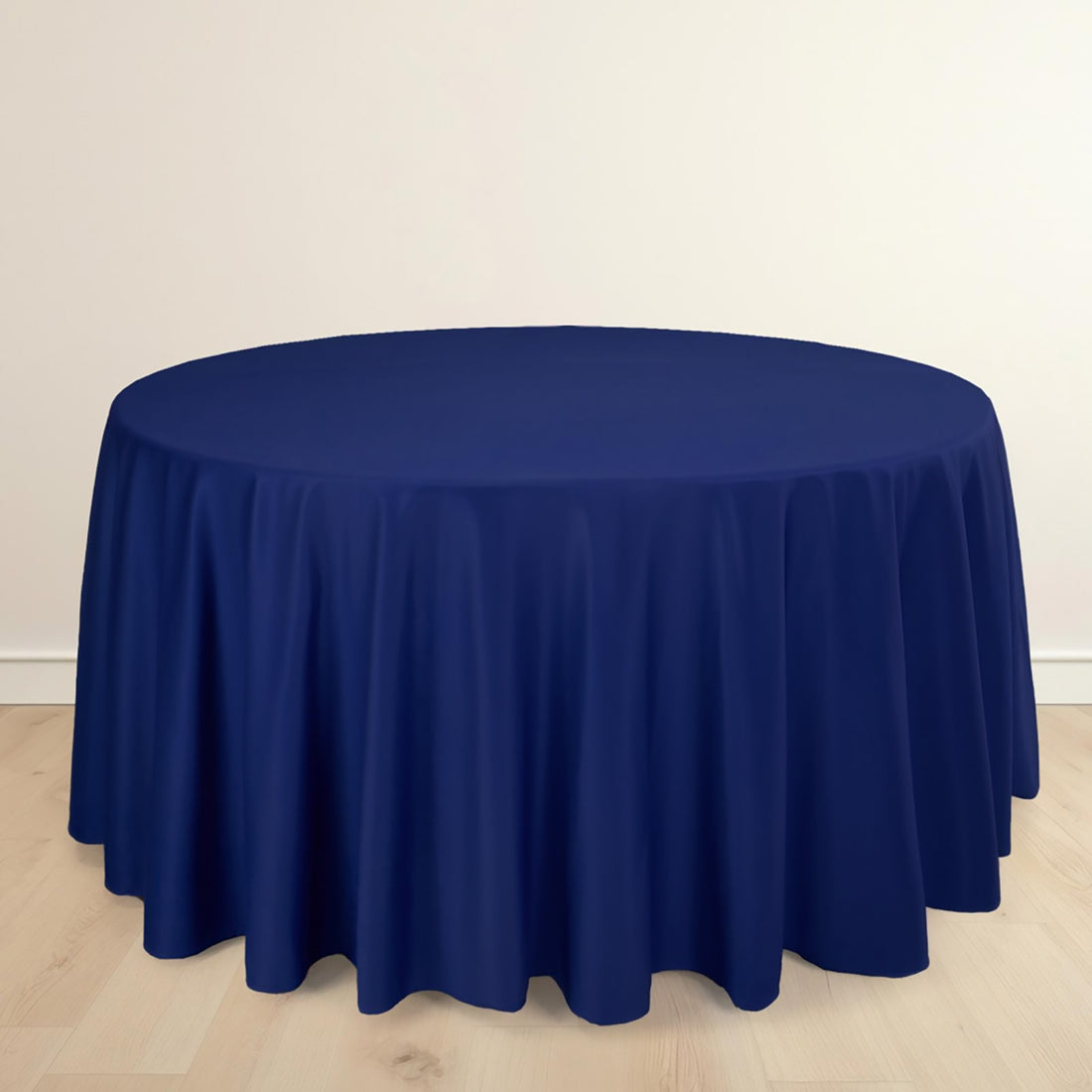 Navy round tablecloth draping elegantly over a circular table.