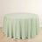 Round mint green tablecloth on a plain background.