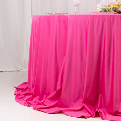 Pink tablecloth draped on a table for events or parties.