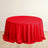 Red round table with elegant draping fabric.