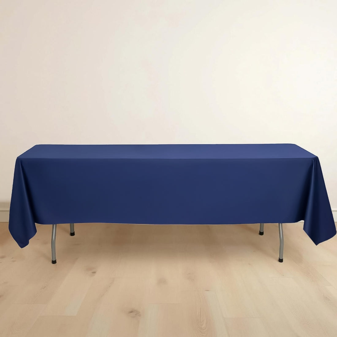 Navy blue tablecloth draped over a rectangular table