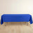 Blue tablecloth draped over a table in a studio setting.