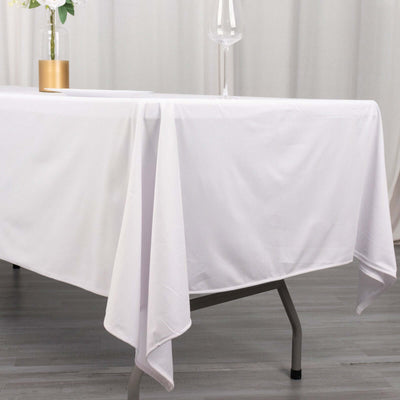 White tablecloth draped over a table in a stylish setting.