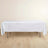 White tablecloth draped over a folding table