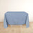 Blue tablecloth draped over a table in a minimalistic setting.