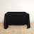 Black tablecloth draped over a table in a studio setting.