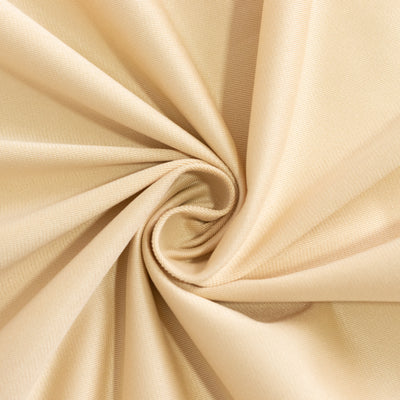 Beige textured fabric swirl showcasing softness and quality.