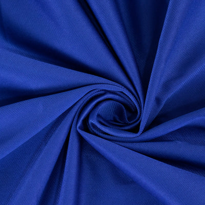 Royal blue fabric texture in a spiral design.