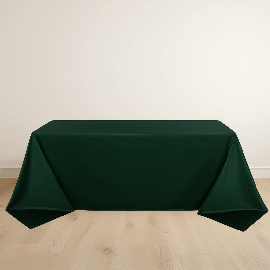 Green tablecloth on a wooden floor