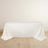 White tablecloth draped elegantly over a table in a minimalist setting.