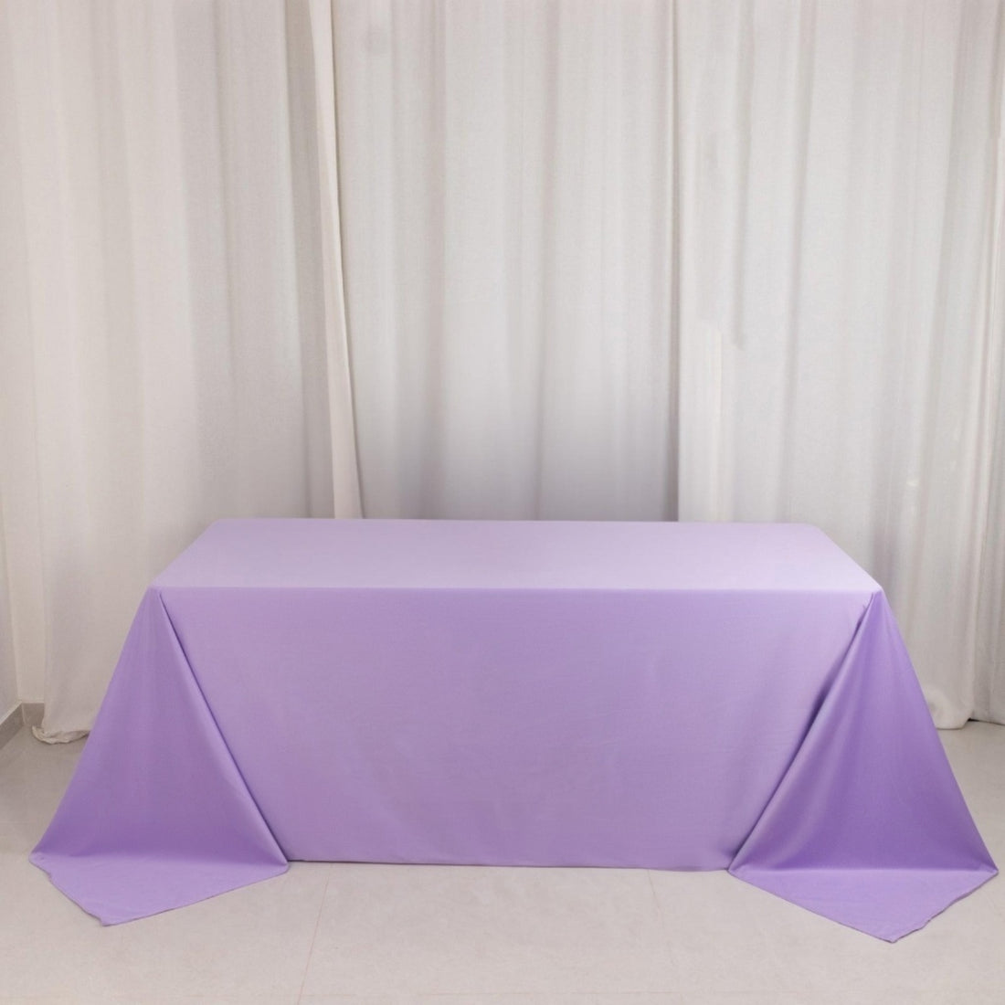 Purple tablecloth draped elegantly over a table.