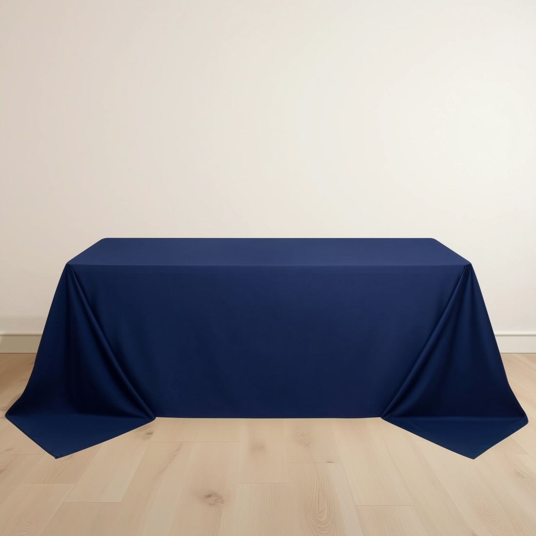 Navy tablecloth draped over a table for elegant events