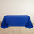 Blue tablecloth draped over a rectangular table on a plain backdrop