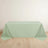 Mint green tablecloth draped elegantly over a table