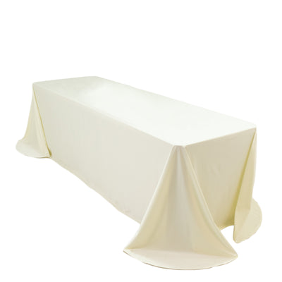 Cream rectangular tablecloth draped elegantly over a table