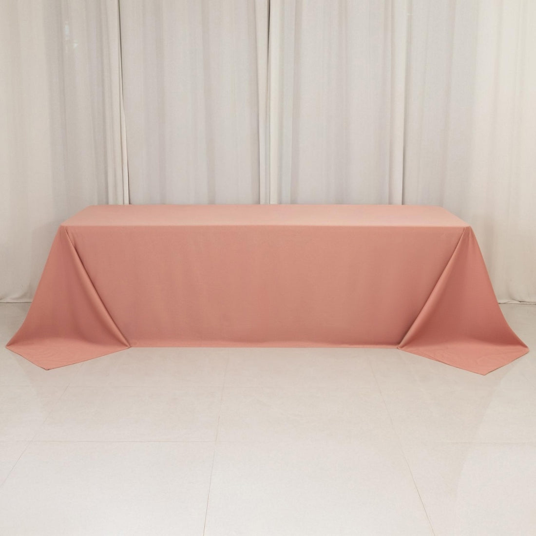 Peach tablecloth draped elegantly on a table 