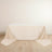 Beige tablecloth draped elegantly over a table.