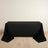 Black tablecloth draped over a table on a light wooden floor.