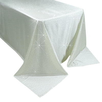 Sparkling white tablecloth with shimmering details, perfect for events.