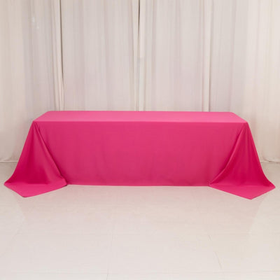 Hot pink tablecloth draped over banquet table