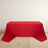 Red tablecloth draped on a table, creating a vibrant display.