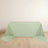 Mint green tablecloth with draped edges on a plain surface.