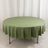 Green round tablecloth on display against a plain backdrop.