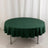 Green round tablecloth with a scalloped edge on a white backdrop