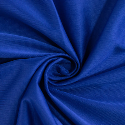 Royal blue fabric swirl, showcasing texture and color depth.
