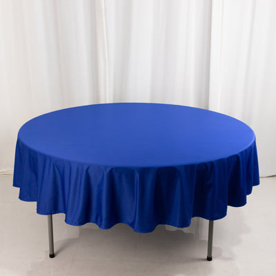 Round blue tablecloth draped elegantly over a table
