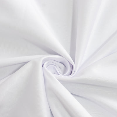 White fabric texture in a swirl pattern.