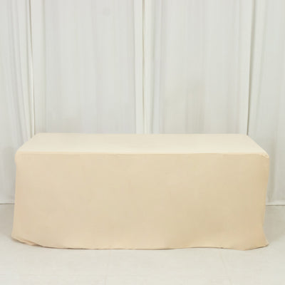 Beige table cover on a plain backdrop for events or home decor.