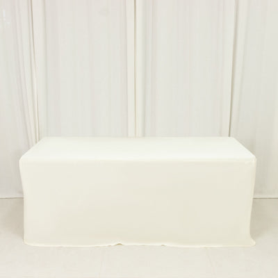 White table cover draped over a rectangular table