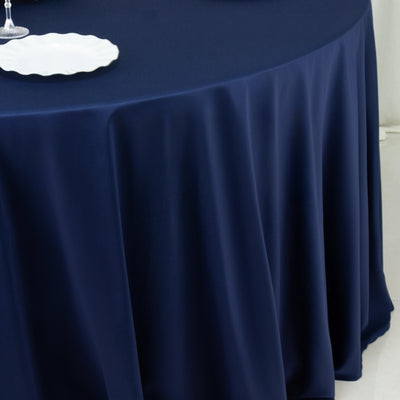 Close-up of navy tablecloth drape and edge detail