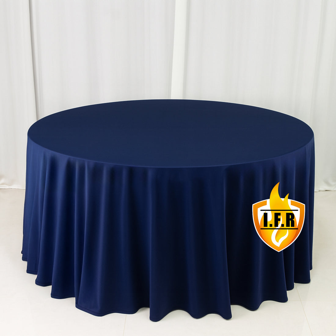 Navy round tablecloth with elegant drape and logo on a plain backdrop 